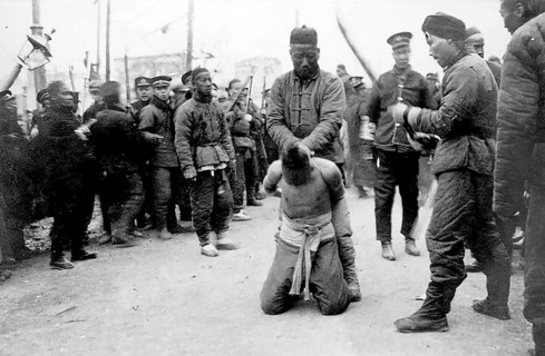 Boxer Rebellion China, execution of Chinese during the Boxer War. A Chinese man is beheaded in