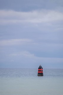 Lighthouse on a Sea in Granville, Manche, Normandy, France