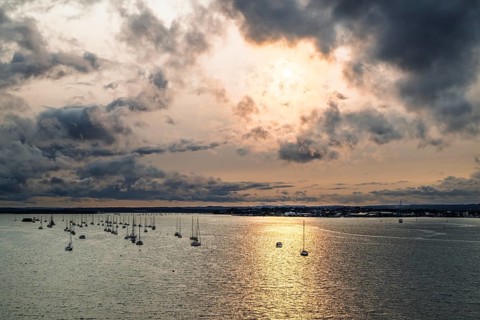Sunset of Yachts over Ramshorn Lake and Brownsea, Poole, Dorset, England, United Kingdom