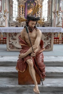 Large figure of Jesus in front of the altar of the collegiate basilica, Neustift St Margarethen,
