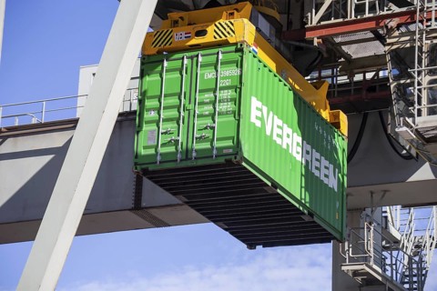 Mannheim: A container from the Evergreen container shipping company is loaded in the harbour
