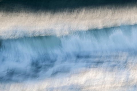 Dynamic waves with a blurred effect create a feeling of movement on the sea, near Hvide Sande,