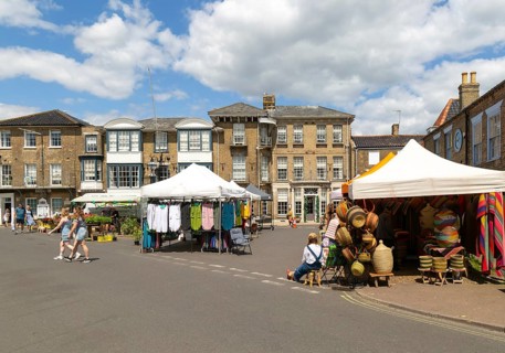 Market stalls in Market Place, town centre of Southwold, Suffolk, England, UK