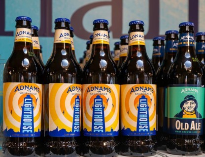 Adnams beer products on display inside brewery shop, Southwold, Suffolk, England, UK - Lighthouse