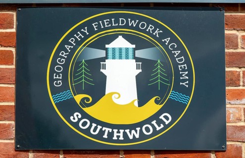 Geography Fieldwork Academy logo sign, Old Hospital community space building, Southwold, Suffolk,