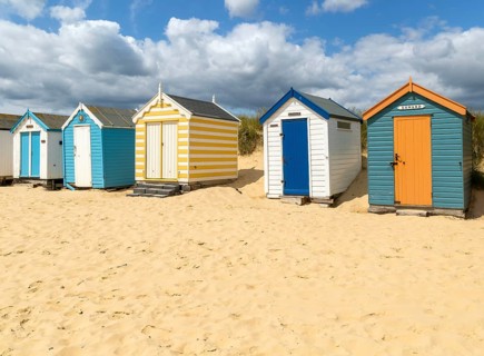 Seaside beach huts on the seafront at Southwold, Suffolk, England, UK