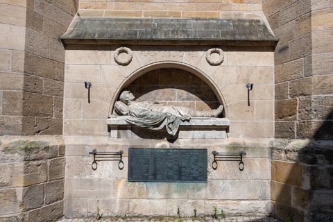 War memorial at the parish church of St Dionys, created in 1910 by Karl August Donndorf in the old