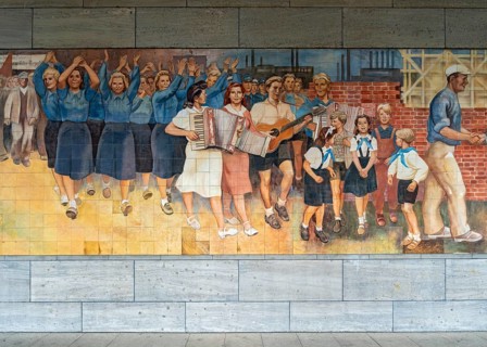 Close-up of the GDR-era Max Lingner propaganda mural, Detlev Rohwedder House, Berlin, Germany