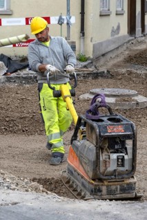 Construction site Road construction Construction worker Vibratory plate
