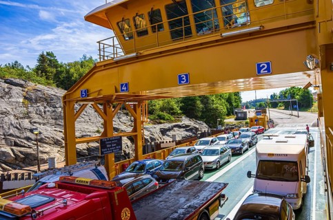 Cars and lorries on a car ferry operating as a floating road, near Lysekil, BohuslÃ¤n, VÃ¤stra