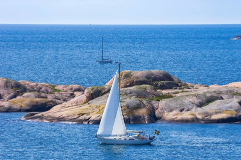 Archipelago with sailing boats off the coast of Lysekil, BohuslÃ¤n, VÃ¤stra Götalands lÃ¤n, Sweden,