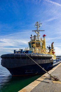 The tug SVITZER GAIA is moored in the harbour of Lysekil, BohuslÃ¤n, VÃ¤stra Götalands lÃ¤n,
