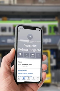 Symbolic image of mobile phone scam, warning of fraudulent calls, here the provider Vodafone, warns