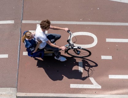 Cycling in the Netherlands, Utrecht, typical riding style with 2 people on one bike