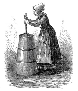 Dairy farming, woman making butter with a butter churn, around 1860, digitally enhanced