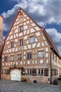 Historic half-timbered house from 1799, today restaurant and apartments, Hersbruckerstr. 1, Lauf an