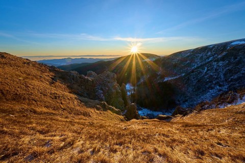 Strong sun rays over mountain landscape, clear blue and expanse, view of the Rhine Valley,