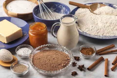 Baking ingredients such as flour, milk and spices are prepared for baking