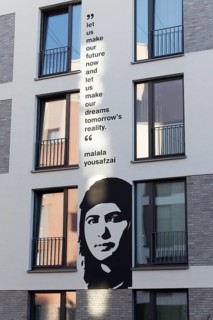 Malala Yousafzai, portrait mural and quote from the Nobel Peace Prize winner at a student