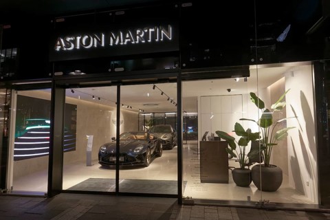 Aston Martin Düsseldorf, illuminated showroom with luxury sports car, Düsseldorf, North