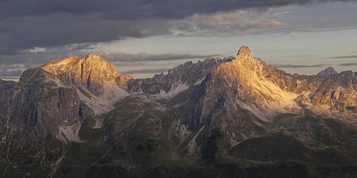Sunrise on the Mindelheim via ferrata, a mountain range with the three sheep alpine heads up to the