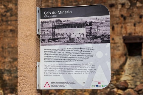 Explanatory board at the ruins of the former ore dock, Mina de Sao Domingos, historic copper
