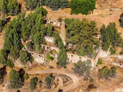 Ruins of former workshop halls, Mina de Sao Domingos, historic copper open-pit mine, aerial view,