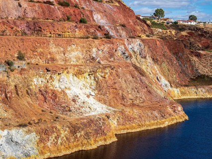 Terraces built for ore extraction, Mina de Sao Domingos, historic copper open-pit mine, Portugal