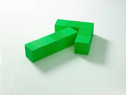 9 green wooden cubes against a white background