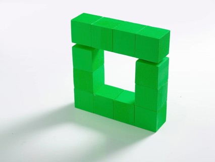 12 green wooden cubes against a white background