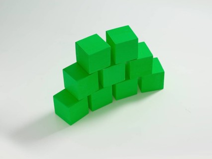 9 green wooden cubes against a white background
