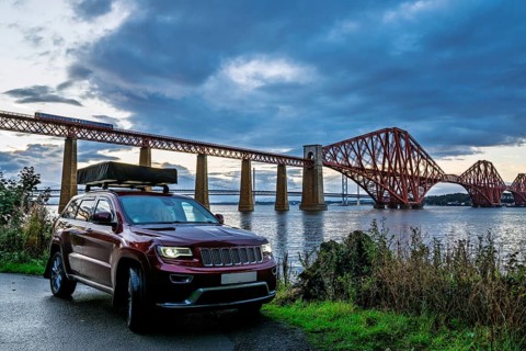 4x4 car trip with roof tent in Forth Bridge, Queensferry Crossing, Forth Estuary, Scotland, United