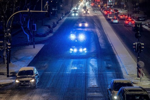 Ambulance, RTW, the Essen professional fire brigade during an emergency trip with flashing lights,