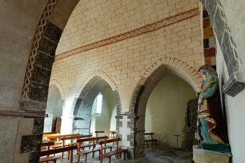 Painted church St Aignan's Church of Begues. Ogival arcades. Allier department. Auvergne Rhone