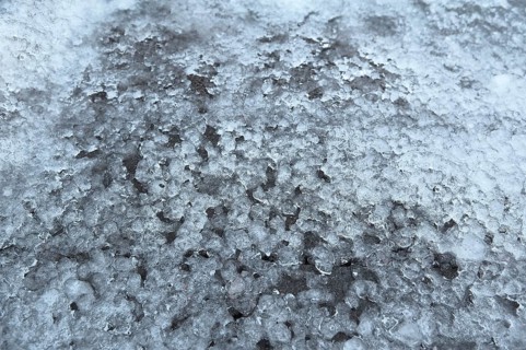 Melting snow on road