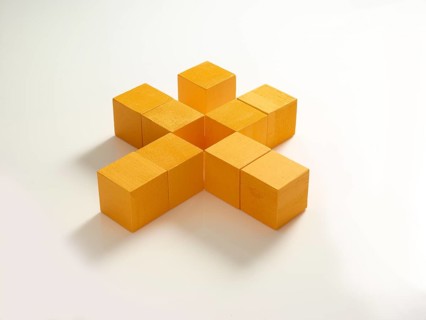 9 yellow wooden cubes against a white background