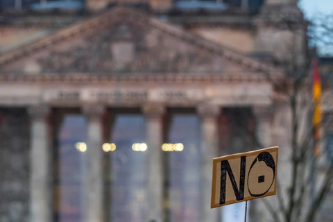 Sign with the inscription No, No, and stylized head of Adolf Hitler, in the back the German