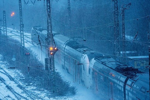 Winter weather, snowfall, RRX, Rhine-Ruhr Express, regional traffic, on the route east, in front of