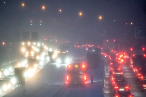 Winter weather, motorway traffic, A40 motorway, Ruhrschnellweg, in Essen, at the Essen-East