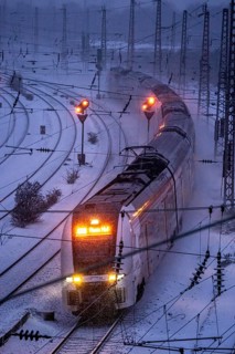 Winter weather, snowfall, RRX, Rhine-Ruhr Express, regional traffic, on the route east, in front of