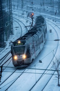 Winter weather, snowfall, VIAS regional express, regional traffic, on the route east, in front of