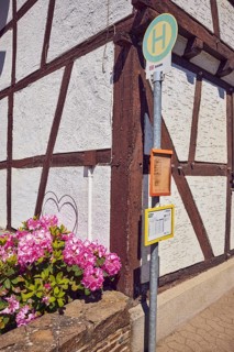 Bus stop Insul Gasthaus Keuler, half-timbered house, facade, flower, sunny, Insul, Ahrweiler