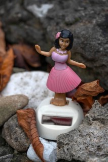 Dashboard wobble figure hula woman solar Hawaiian hula girl dancing in a garden, Bavaria, Germany