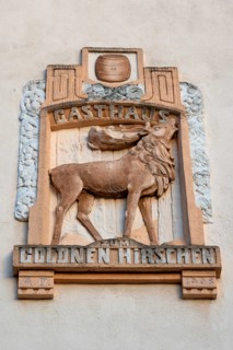 Relief of the Gasthaus Zum Goldenen Hirschen on a house façade, Fürth, Middle Franconia, Bavaria,
