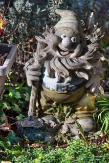 Garden gnome in a front garden, Franconia, Bavaria, Germany