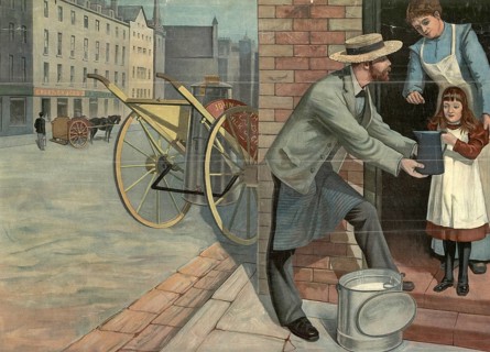 Milchman delivers fresh milk to the front door, 1900, England, authentic reproduction of a school