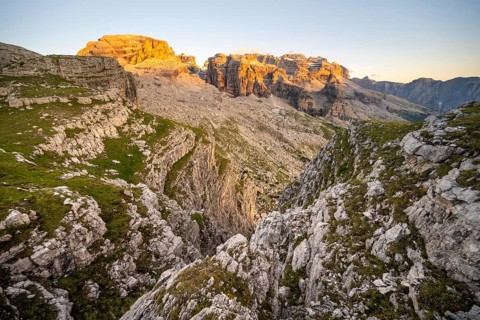 View of rocky mountain peaks of the Brenta Mountains at sunset, Alpenglühen, mountain landscape on