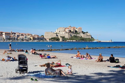 Calvi beach, back the citadel, Balagne, Haute-Corse department, Corsica, France