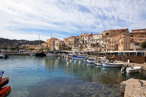 Colourful boats and restaurants in the port of Calvi, Balagne, Haute-Corse department, Corsica,