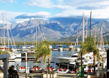 Calvi marina, with the mountains of the Balagne region in the Haute-Corse department, Corsica,